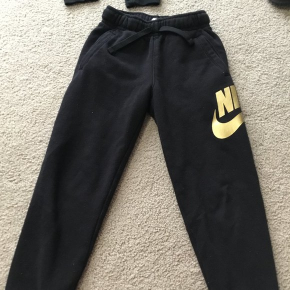 nike sweatpants black and gold